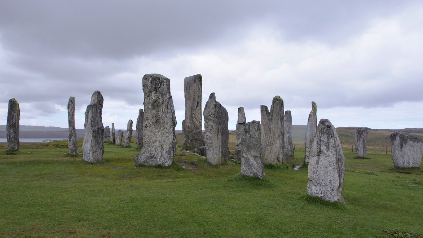 Calanais_1220a.JPG - Callanish Stones in the rain. The stone circle was set up between 2900 and 2600 BC however there is evidence of prior occupation.