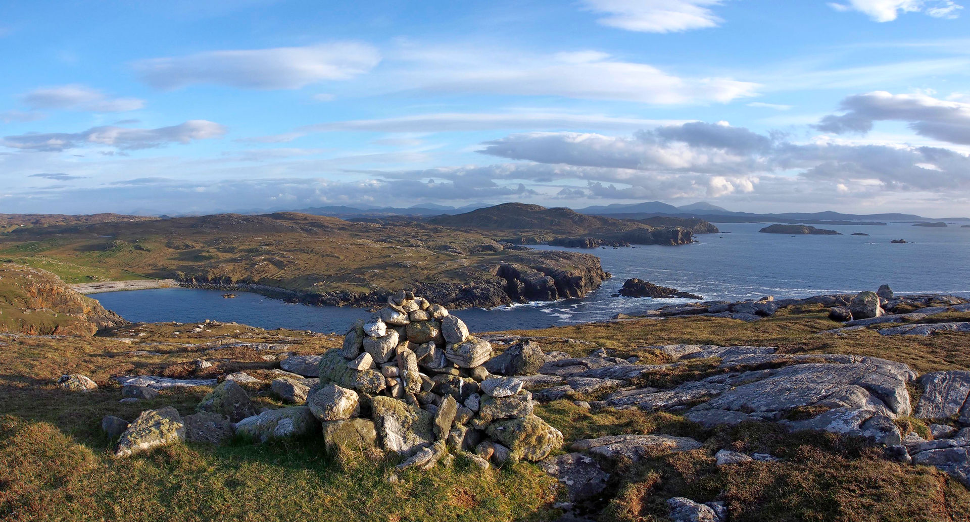 blackhouse-1188-89_stitch.jpg - looking down to the Ruadh Geo. A Geo being a break in the cliffs where one can launch a boat.